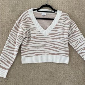 Beige and white sweater